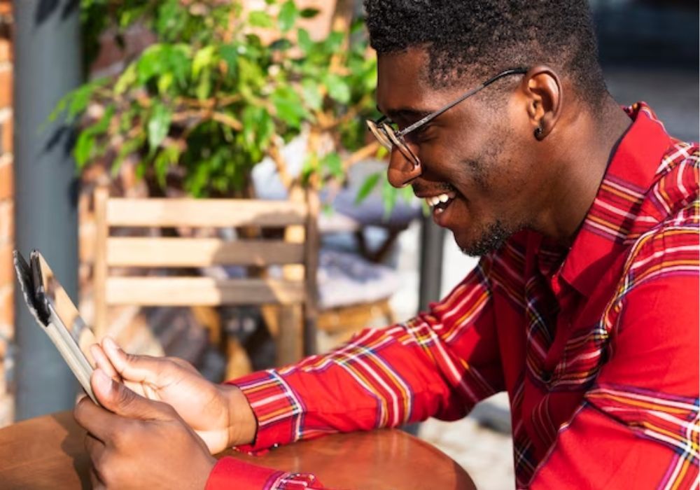 Person using smartphone with mobile money app